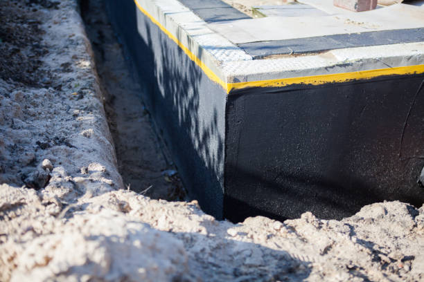 Professional Waterproofing technician working in Aurora, IL